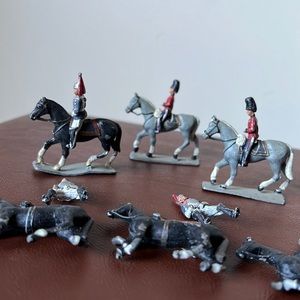 Vintage cast iron toy British guards on horses